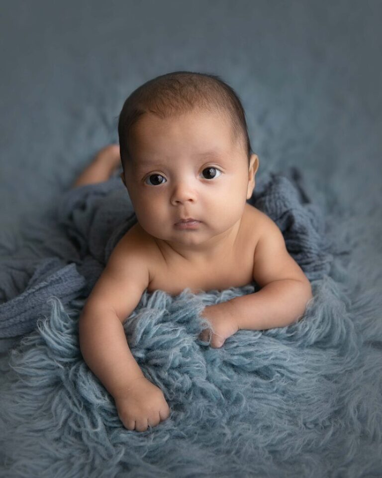 4 month old doing tummy time for his picture